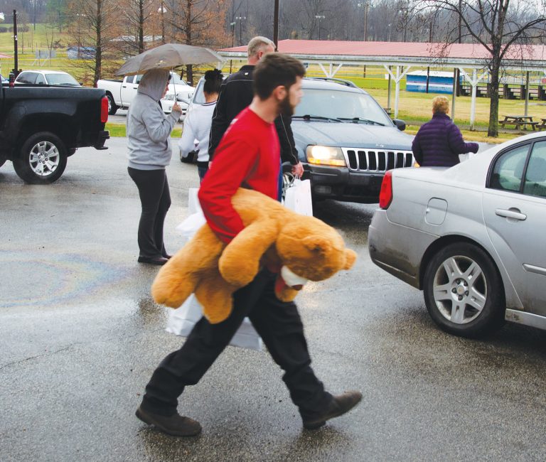 Photo Gallery: Toys for Tots and local groups provide toys for 200 kids, hams for 87 families