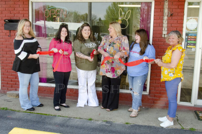 Leah Jane’s Salon opens with a “quick cut” of the ribbon