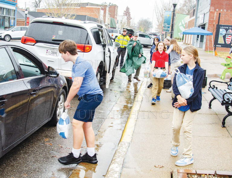 Volunteers of all ages lend a hand at annual Turkey Giveaway