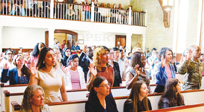 Watermarked Naturalization - Crowd oath 3 col rgb